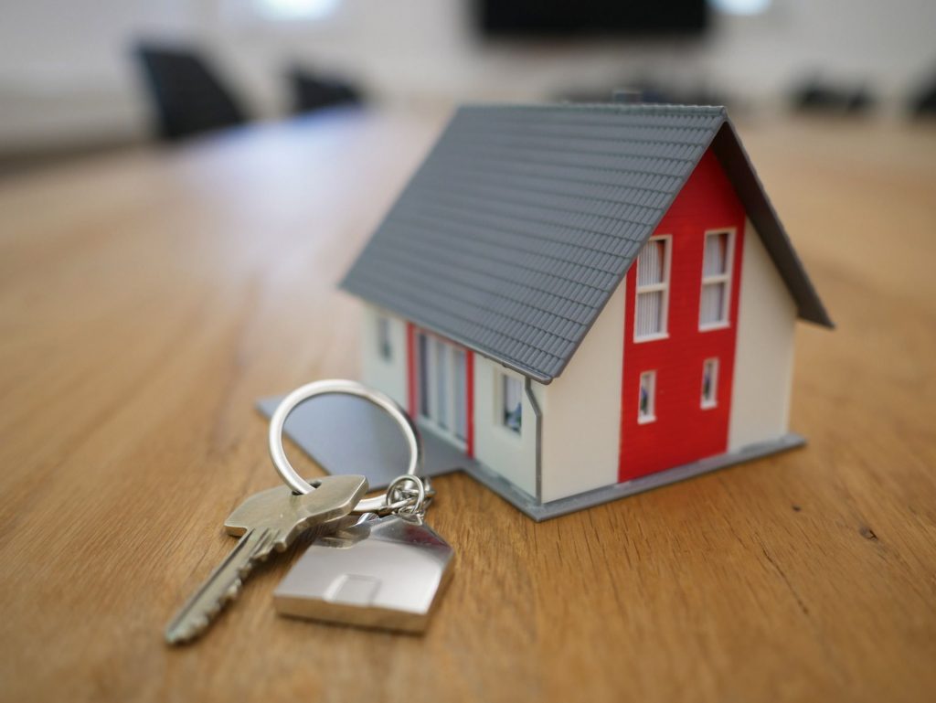 keys next to a tiny house