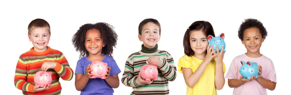 five smiling children holding piggy banks
