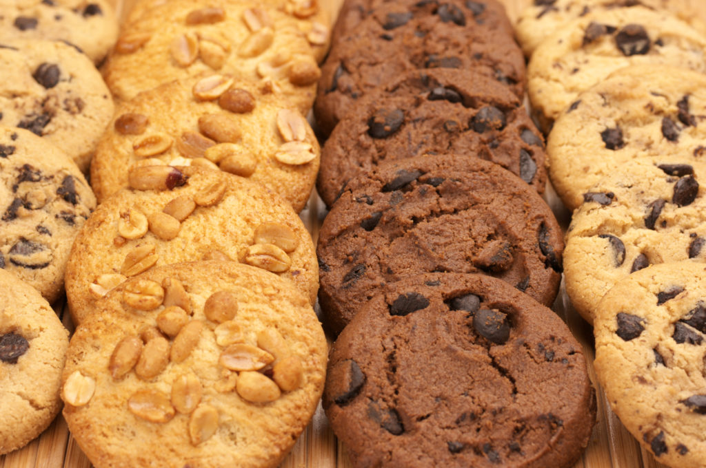 Assorted tasty cookies in rows 